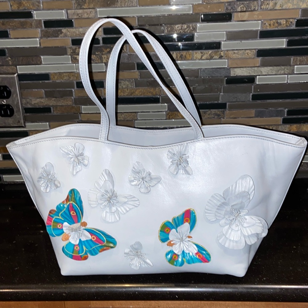 Baby blue Italian leather handbag.